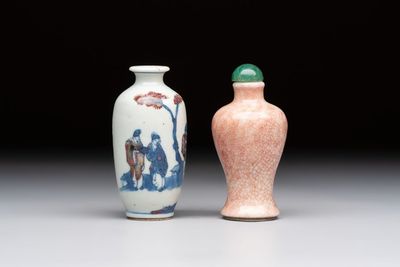 A Chinese peachbloom-crackle-glazed 'meiping' snuff bottle and a figural blue, white and copper-red snuff bottle, Yongzheng mark, 19th C.