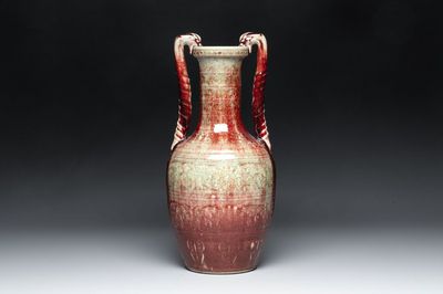 A Chinese peachbloom-glazed vase with dragon-form handles, 18th C.