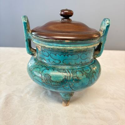 A Chinese peacock-blue-glazed tripod incense burner with wooden cover — photo 1
