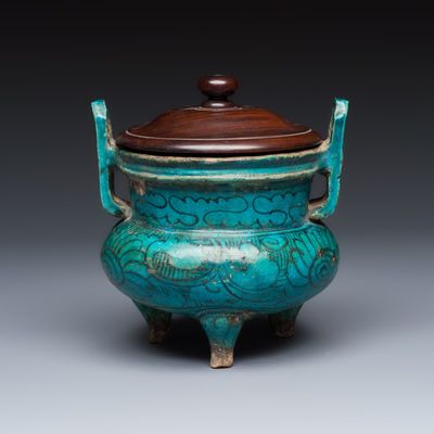A Chinese peacock-blue-glazed tripod incense burner with wooden cover, Ming