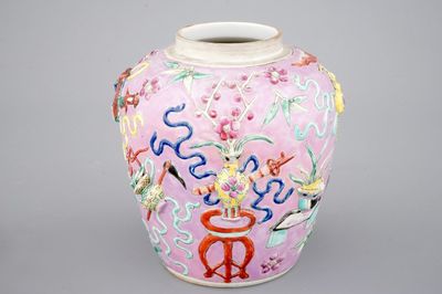 A Chinese pink ground relief-decorated ginger jar, 19th C.