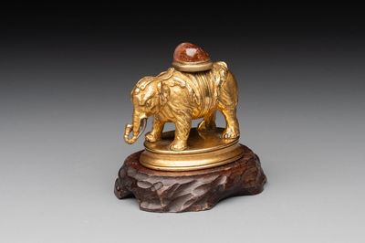 A Chinese pink quartz-inset gilt bronze elephant, 18th C.