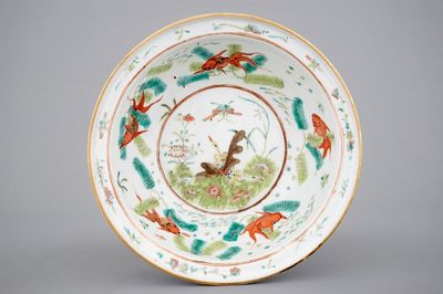 A Chinese polychrome bowl decorated with butterflies and fish, 19th C.