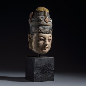A Chinese polychromed carved stone head on a stand — photo 1