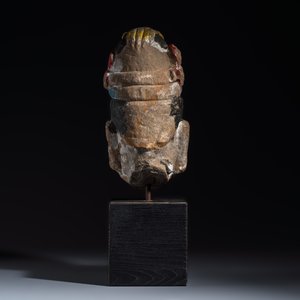A Chinese polychromed carved stone head on a stand — photo 4