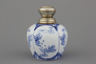 A Chinese porcelain blue and white vase with silver mounts, 20th C.