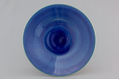 A Chinese porcelain blue monochrome plate, 19th C.