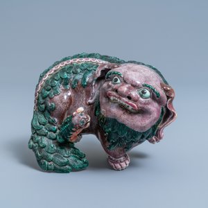 A Chinese porcelain 'Buddhist lion and cub' group on carved wooden stand, 19th C. — photo 6