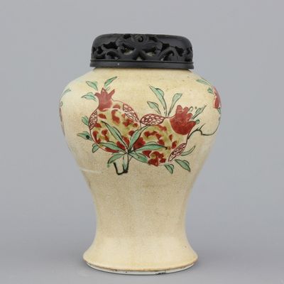 A Chinese porcelain cafe au lait vase with wucai sanduo decoration, Kangxi, ca. 1690