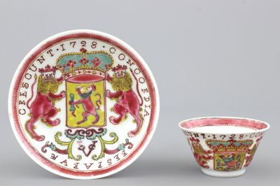 A Chinese porcelain famille rose armorial cup and saucer with VOC coat of arms, dated 1728, Yongzheng