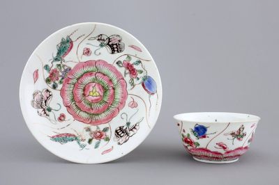 A Chinese porcelain famille rose cup and saucer with insects encircling a rose, Yongzheng-Qianlong, 18th C.