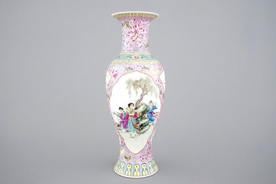 A Chinese porcelain famille rose vase with ladies in a garden, 20th C