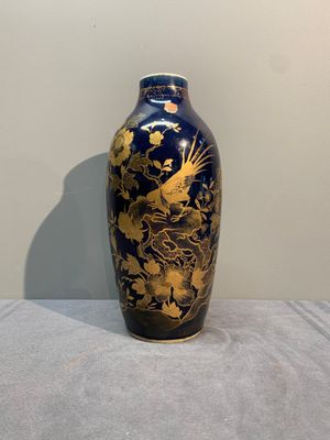 A Chinese powder blue and gilt vase with a pheasant among flowering branches, Qianlong — photo 1