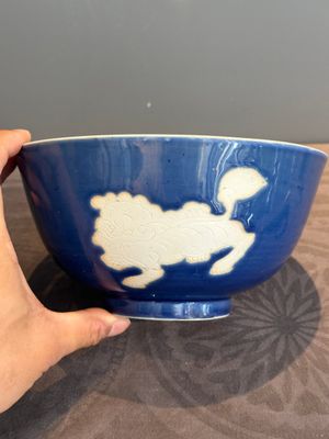 A Chinese powder blue-ground biscuit, blue and white 'Buddhist lion' bowl, Xuande mark, Kangxi — photo 1