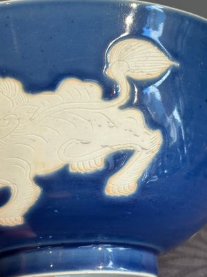 A Chinese powder blue-ground biscuit, blue and white 'Buddhist lion' bowl, Xuande mark, Kangxi — photo 6