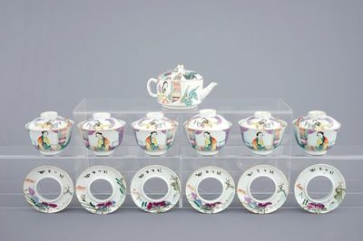 A Chinese qianjiang cai teapot and six matching covered cups on stands, 19/20th C.