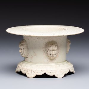 A Chinese qingbai censer with masks in relief, 20th C — photo 1