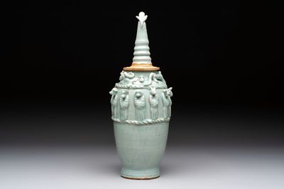 A Chinese qingbai-glazed covered urn applied with zodiac figures, Song