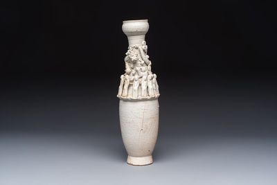 A Chinese qingbai urn applied with immortals and a dragon, Northern Song
