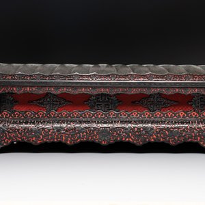 A Chinese rectangular carved red and black lacquer stand, 20th C. — photo 3