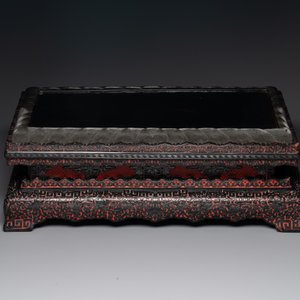 A Chinese rectangular carved red and black lacquer stand, 20th C. — photo 5