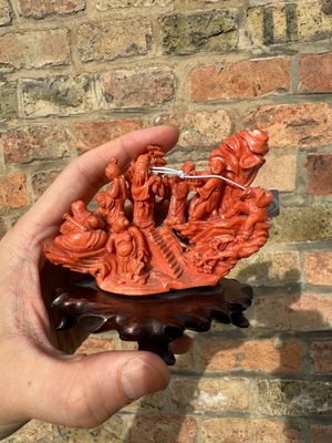 A Chinese red coral 'Eight Immortals' group on wooden stand, 19/20th C. — photo 1