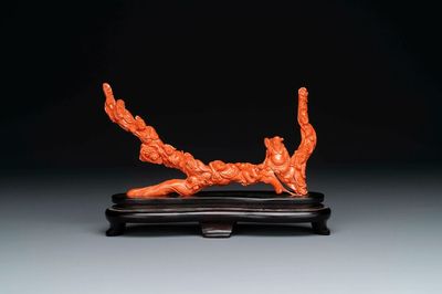 A Chinese red coral 'Eight Immortals' group on wooden stand, 19/20th C.