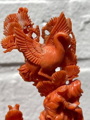 A Chinese red coral group of Shoulao with two boys holding a peach, inscribed 'Shou Bi Nan Shan 壽比南山', 19/20th C. — photo 23