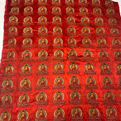 A Chinese red-ground brocade panel with seated Buddhas — photo 14