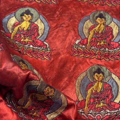 A Chinese red-ground brocade panel with seated Buddhas — photo 15