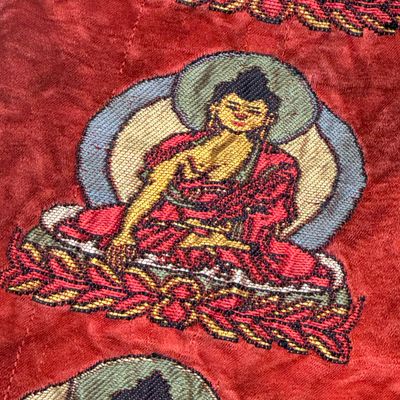 A Chinese red-ground brocade panel with seated Buddhas — photo 16