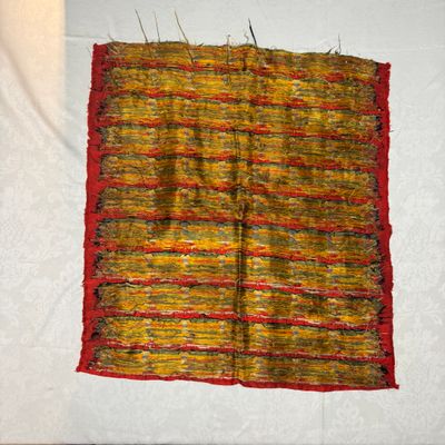 A Chinese red-ground brocade panel with seated Buddhas — photo 17