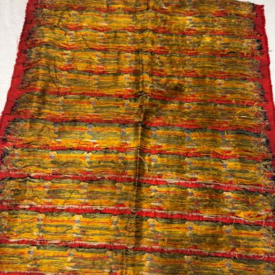A Chinese red-ground brocade panel with seated Buddhas — photo 30