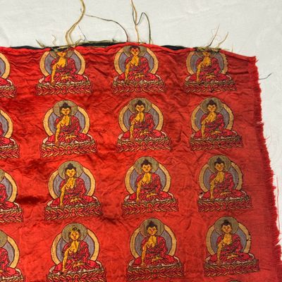 A Chinese red-ground brocade panel with seated Buddhas — photo 9