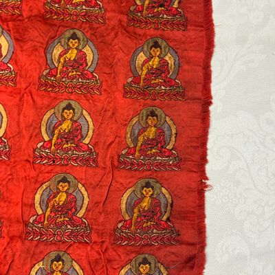 A Chinese red-ground brocade panel with seated Buddhas — photo 10