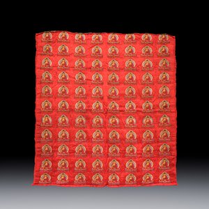 A Chinese red-ground brocade panel with seated Buddhas — photo 1