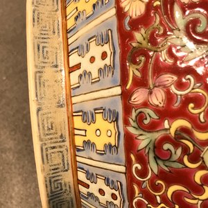 A Chinese red-ground famille rose bottle vase, Qianlong mark, 19/20th C. — photo 8