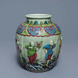 A Chinese relief-decorated famille rose celadon-ground vase, 19/20th C. — photo 1