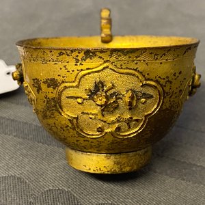 A Chinese relief-decorated gilt bronze cup, Ming — photo 15