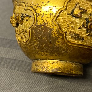 A Chinese relief-decorated gilt bronze cup, Ming — photo 9