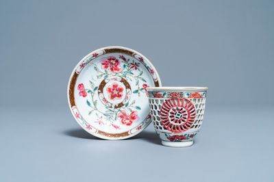 A Chinese reticulated double-walled famille rose cup and saucer, Yongzheng