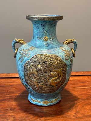 A Chinese robin's egg and faux bronze-glazed 'hu' vase, Qianlong mark, 19th C. — photo 1