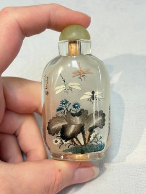 A Chinese rock crystal and two glass inside painted snuff bottles, 19/20th C., with a signed copy of 'Chinese Inside Painting of the Modern Age', 2005 — photo 1