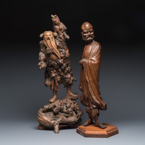 A Chinese rootwood sculpture of an immortal and a boxwood sculpture of Bodhidharma — photo 1