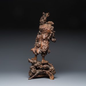 A Chinese rootwood sculpture of an immortal and a boxwood sculpture of Bodhidharma — photo 11