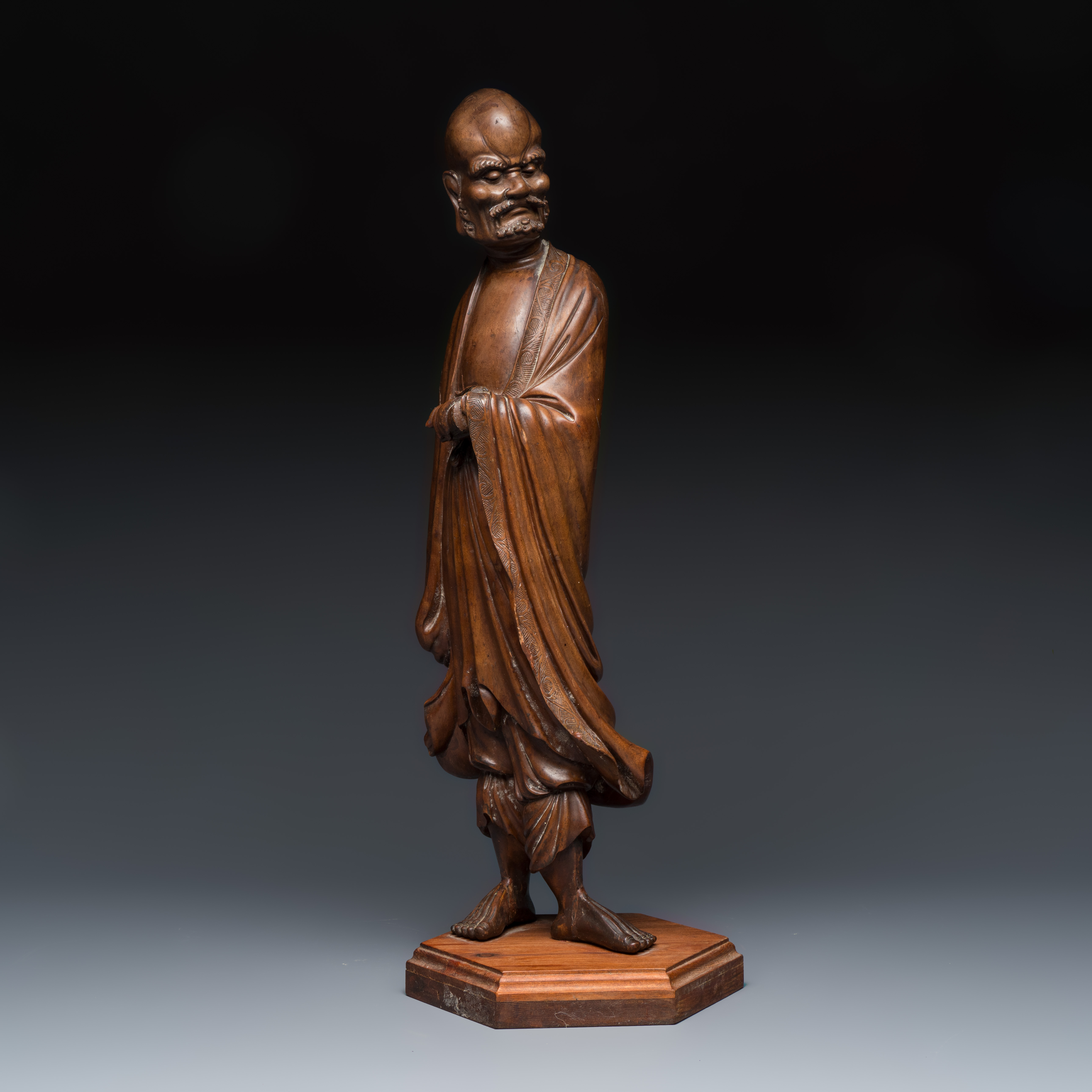 A Chinese rootwood sculpture of an immortal and a boxwood sculpture of Bodhidharma — photo 3