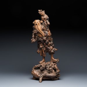 A Chinese rootwood sculpture of an immortal and a boxwood sculpture of Bodhidharma — photo 9