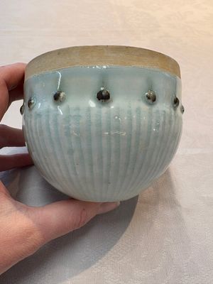 A Chinese russet-glazed qingbai Buddhist bowl, Song or later — photo 1