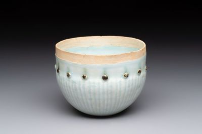 A Chinese russet-glazed qingbai Buddhist bowl, Song or later