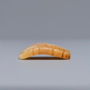 A Chinese russet jade 'Tiger Charm' inscribed pendant, 19/20th C. — photo 4